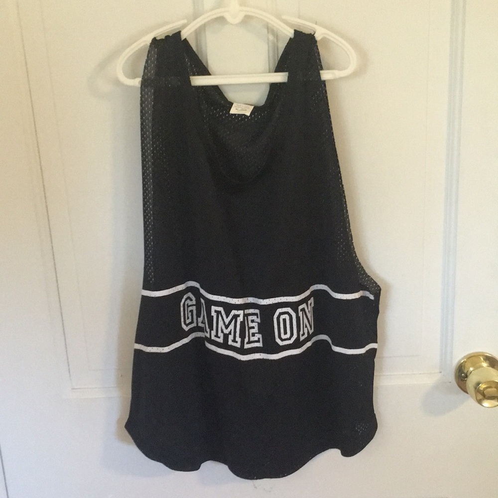 Black tank top jersey.